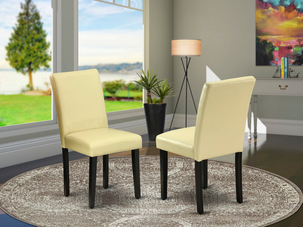 Elegant Dining Chairs Set ABP1TPL in Eggnog Faux Leather, Black Finish Upholstery, Set of 2