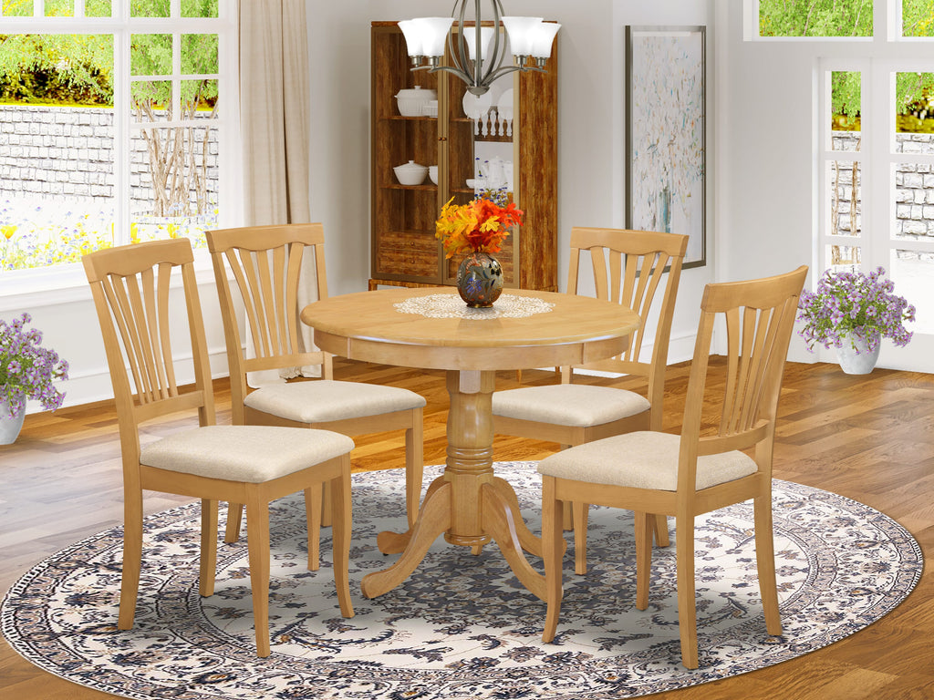 ANAV5-PCZ-L 5 Piece Dining Ensemble with Rounded Table and Linen Chairs for Four in Oak Finish