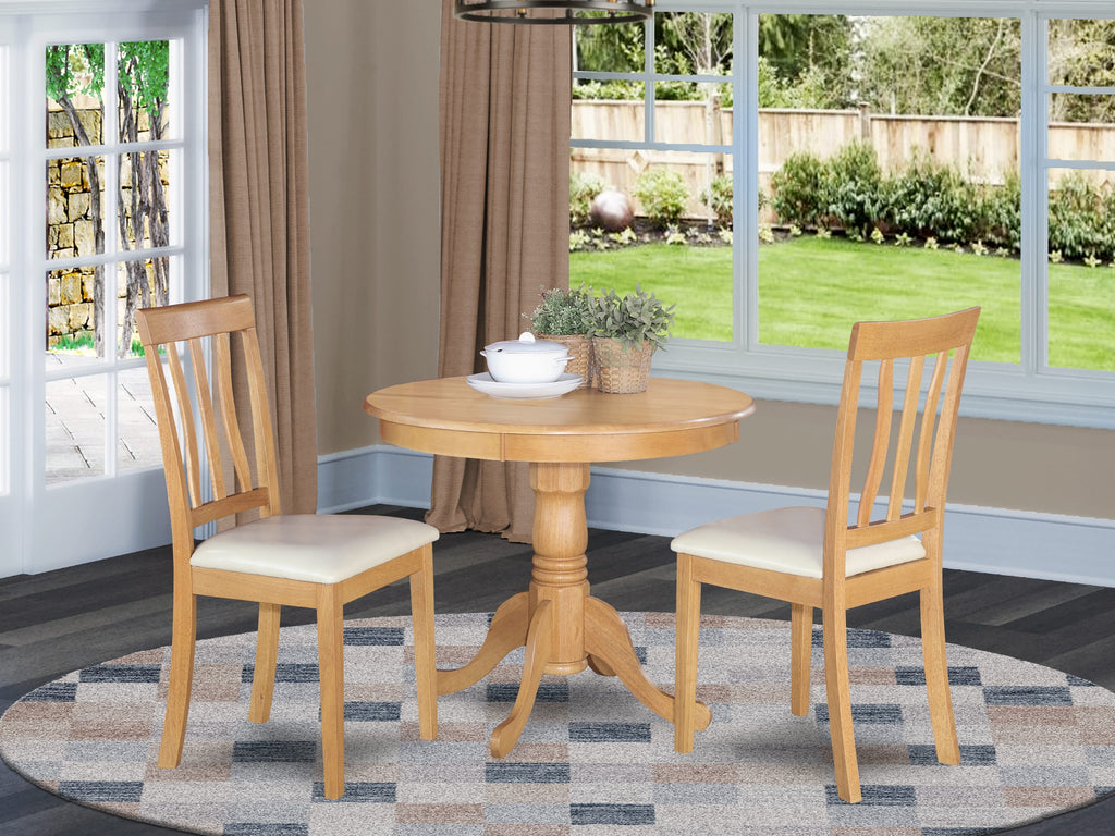 ANTI3-NFY-X1 Chic Oak 3-Piece Round Dining Ensemble for Compacts with Faux Leather Seats