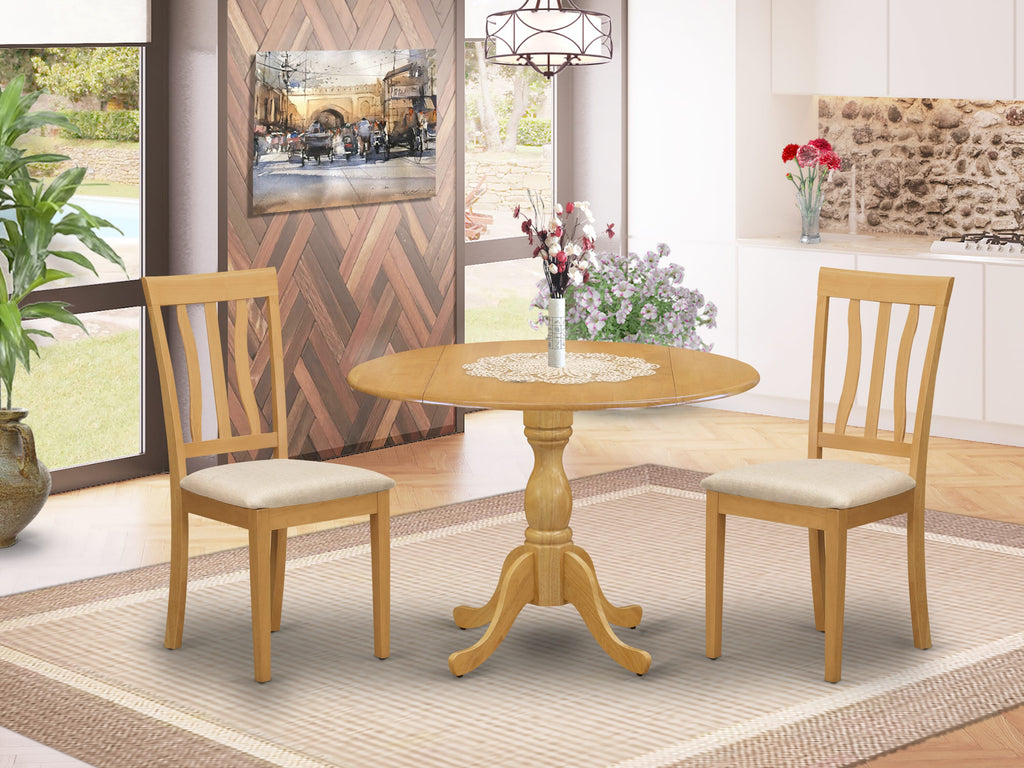 DMAN3-GT9-2 3 Piece Compact Dining Ensemble with Dropleaf Round Table and Two Upholstered Cushions