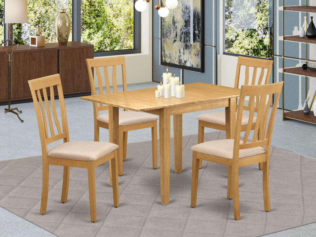 NDAN5-DC1 Dining Ensemble Featuring a Dropleaf Table & Four Faux Leather Chairs in Elegant Oak Finish